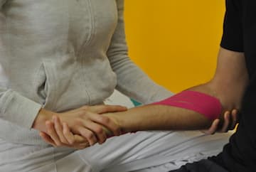 Kinesio-tape all'avambraccio